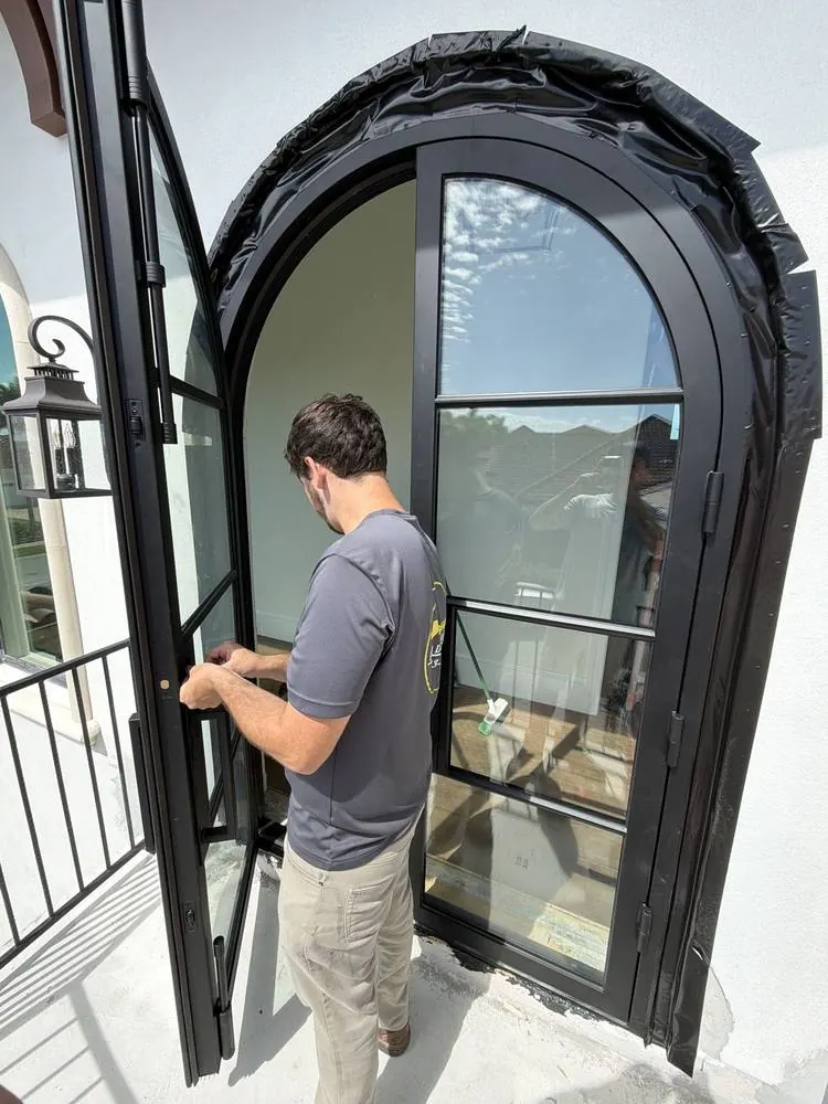 Final adjustments on an arched entry